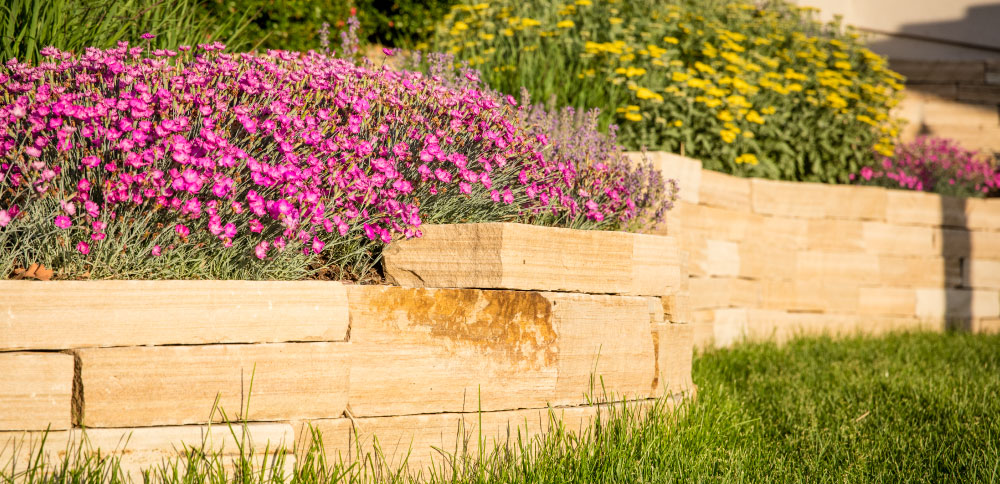 C&H Landscaping Stone Retaining Wall Landscape Design