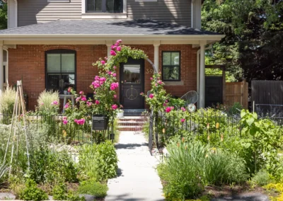 charming cottage with rose covered archway