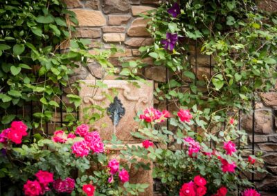 stone wall garden with fountain